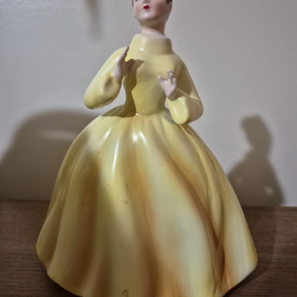 Vintage Yellow Ceramic Figurine